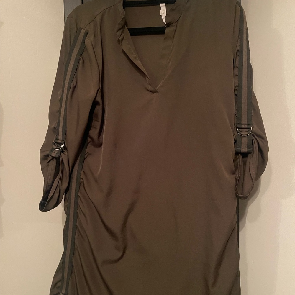 Olive green, light weight long sleeve to mid sleeve.adjustable arm.